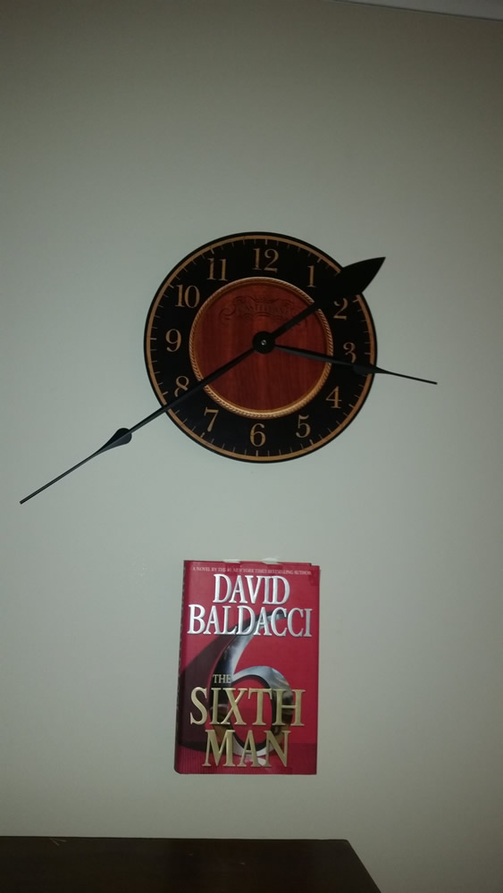 Using the cheap clock as a guide I positioned my lowest book
